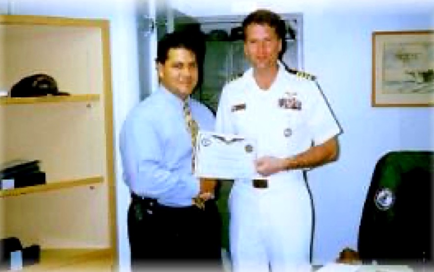 Alexander Penalta with Admiral James 'Jaws' Winnefeld aboard USS John C. Stennis