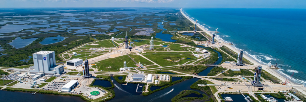 Illustrated aerial view of Cape Canaveral launch complexes on Florida's Space Coast